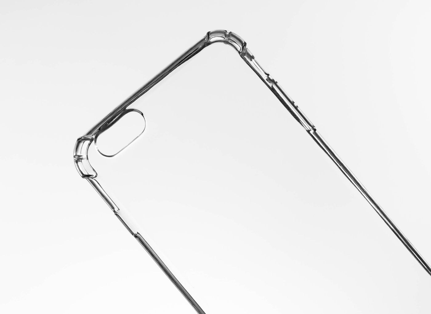 Clear protective phone case showing its edges and cutouts