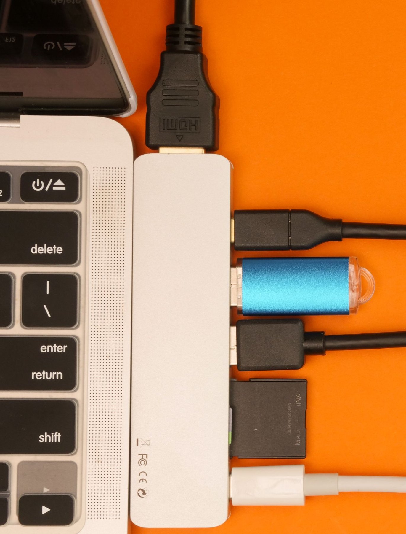 Laptop with several cables connected at its side