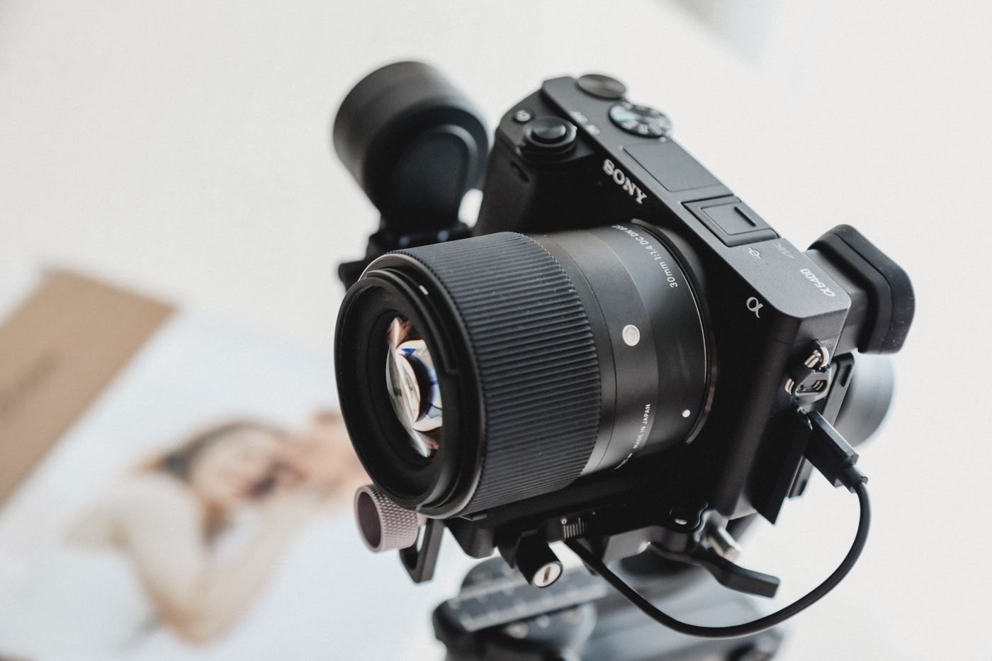 Camera secured to a tripod head