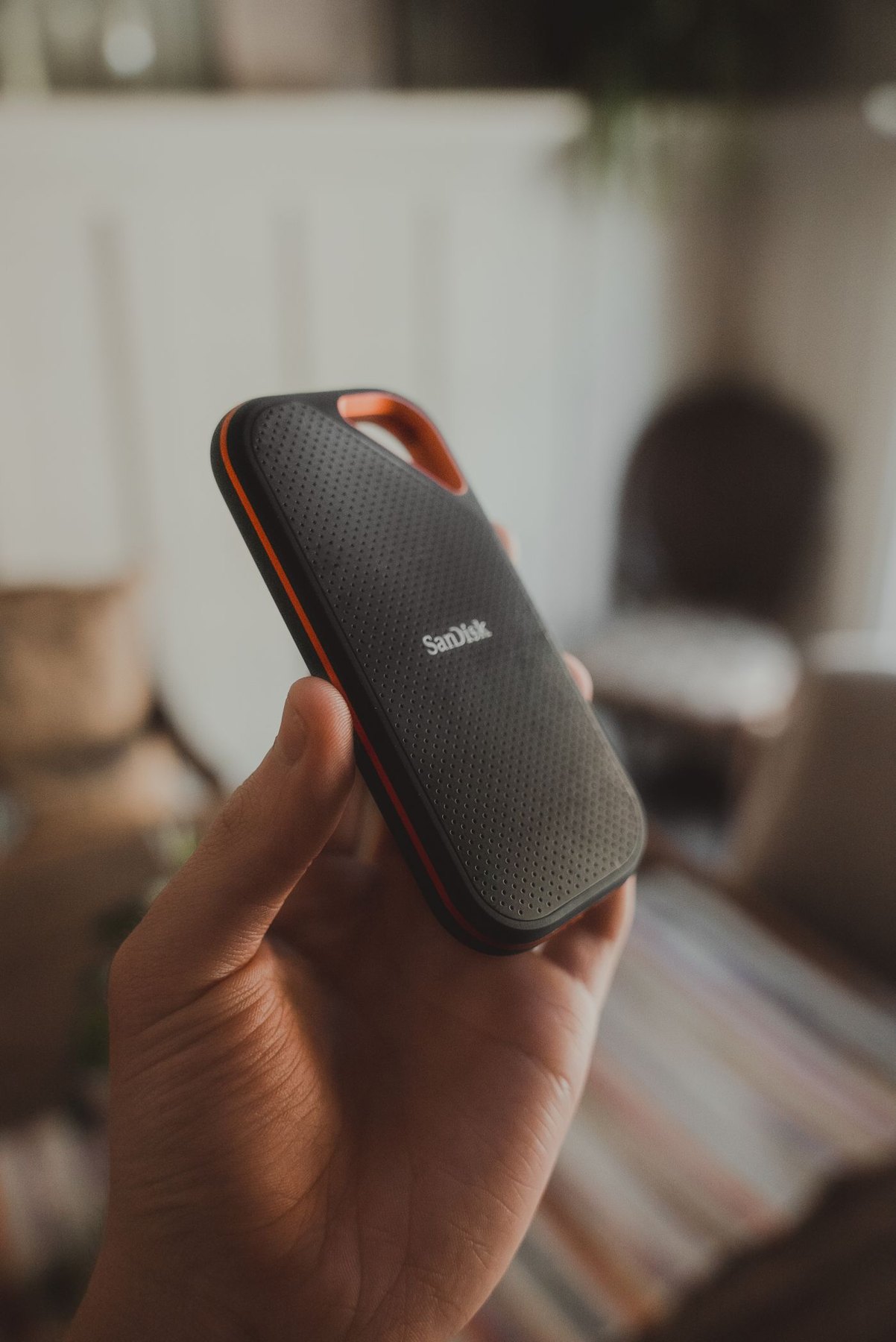 Hand holding a portable solid-state drive