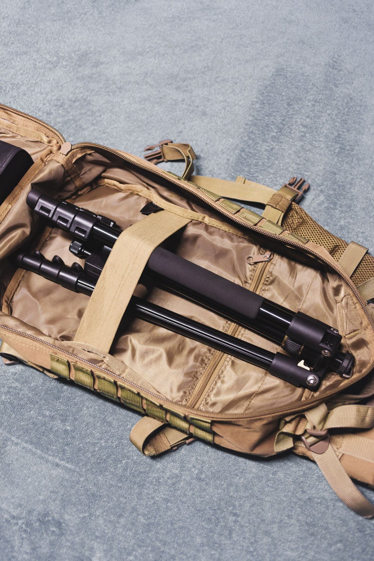 Folded tripod packed inside a camera bag