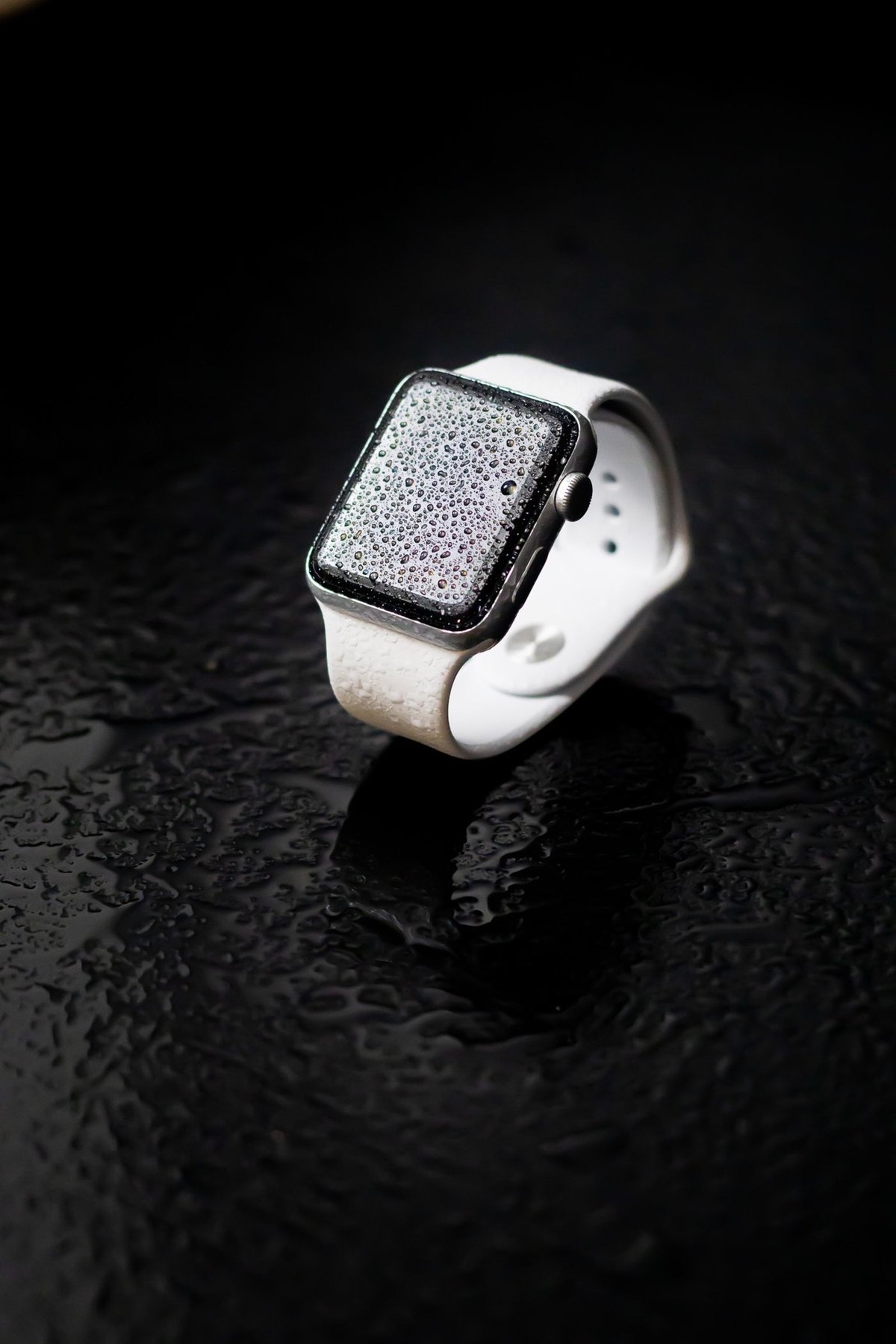 Water droplets on a white smartwatch
